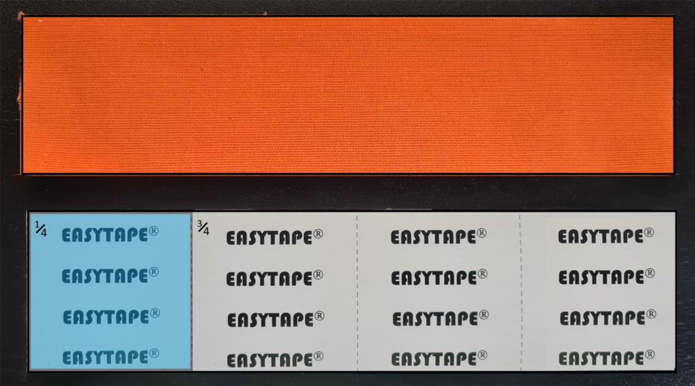 Elastic tape. The back of the elastic tape of the brand Easytape® is separated by 5×5 squares. In all tape techniques as described in the 4xT protocol, the first square is the anchor of the elastic tape, which should be stuck on the skin. The rest of the elastic tape is rubbed out simultaneously with the skin and underlying fasciae with medium-high pressure in the positive direction obtained from the Dynamic ArthroMyofascial Translation® test.